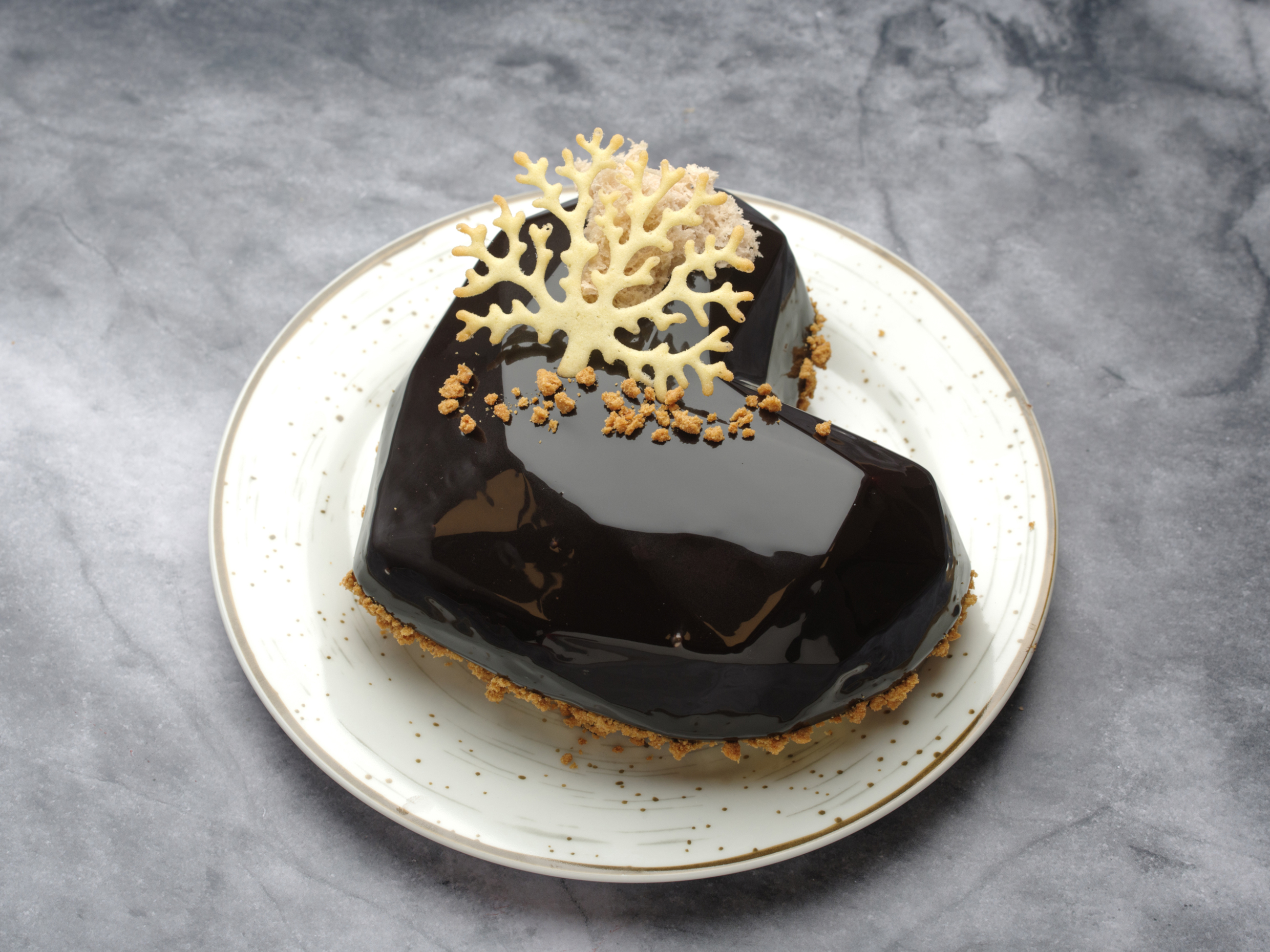 Chocolate Glaze basiert auf belgischer Zartbitterschokolade und Kakaopulver. © Bakels